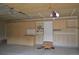 Garage has built-in cabinets, storage, and a workbench perfect for organizing tools and projects at 9232 Bauer Ct, Lone Tree, CO 80124