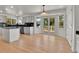 Bright kitchen featuring granite countertops and a breakfast nook with a view at 9232 Bauer Ct, Lone Tree, CO 80124