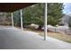 A covered patio shows the home's outdoor living space with views of the landscaped yard at 9232 Bauer Ct, Lone Tree, CO 80124