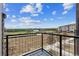 Enjoy scenic views from this balcony with a metal railing at 457 Interlocken Blvd # 106, Broomfield, CO 80021