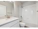 This bathroom features a tub shower and a white quartz countertop at 457 Interlocken Blvd # 106, Broomfield, CO 80021