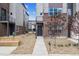 Charming home exterior with a well-maintained walkway and yard at 457 Interlocken Blvd # 106, Broomfield, CO 80021