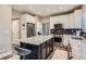 This is a lovely kitchen with stainless steel appliances and a large island at 9458 S Hackberry Ln, Highlands Ranch, CO 80129