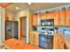 Functional kitchen featuring wooden cabinets, modern appliances, and ample counter space for meal preparation at 812 High Point Dr, Breckenridge, CO 80424