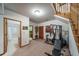 Finished basement with exercise equipment, adjacent bathroom, and plentiful storage space at 767 Tenderfoot Dr, Larkspur, CO 80118