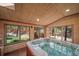 Relaxing hot tub room with views of the surrounding landscape at 767 Tenderfoot Dr, Larkspur, CO 80118