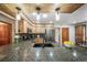 Modern kitchen features granite countertops and stainless steel appliances at 767 Tenderfoot Dr, Larkspur, CO 80118