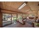 Bright sunroom with hot tub, outdoor access, and lots of natural light at 767 Tenderfoot Dr, Larkspur, CO 80118