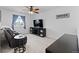 Living room with comfortable chair and TV at 140 Vista Cliff Cir, Castle Rock, CO 80104