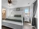 Spacious primary bedroom with lots of natural light and wood floors at 140 Vista Cliff Cir, Castle Rock, CO 80104