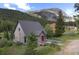 Mountain cabin exterior, deck, and stunning mountain views at 46 Mcdill Rd, Breckenridge, CO 80424