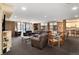 Comfortable common area features seating, tables, and access to outdoor spaces at 2880 S Locust St # 505N, Denver, CO 80222