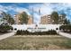 Plaza de Monaco Apartments boasts welcoming signage and beautiful landscaping at 2880 S Locust St # 505N, Denver, CO 80222
