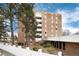 Apartment complex has brick architecture, white accents and manicured grounds at 2880 S Locust St # 505N, Denver, CO 80222