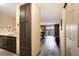 Modern kitchen with stainless steel appliances and ample storage in the wood cabinets at 2880 S Locust St # 505N, Denver, CO 80222