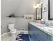 Bathroom features a vanity with double sinks and sleek fixtures at 3182 W 29Th Ave, Denver, CO 80211