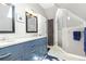 Bathroom boasts a glass-enclosed shower, and stylish vanity at 3182 W 29Th Ave, Denver, CO 80211