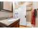 Bathroom featuring vanity with granite countertop and shower at 3182 W 29Th Ave, Denver, CO 80211
