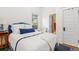 Bedroom with stylish accents and access to an ensuite bathroom at 3182 W 29Th Ave, Denver, CO 80211