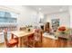 Bright living room with hardwood floors, fireplace, and cozy seating area at 3182 W 29Th Ave, Denver, CO 80211