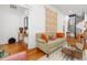 Inviting living room with hardwood floors and a spiral staircase at 3182 W 29Th Ave, Denver, CO 80211