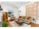 Bright living room with hardwood floors and a view to the front yard at 3182 W 29Th Ave, Denver, CO 80211