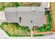 An aerial view of the house features the roof, patio area, deck, and well-maintained landscaping at 598 Arden Cir, Highlands Ranch, CO 80126