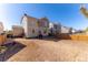 Large backyard offering plenty of potential for landscaping and outdoor enjoyment at 10569 Racine St, Commerce City, CO 80022