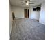 Spacious bedroom featuring neutral walls, ceiling fan, and ample natural light at 2034 S Truckee St, Aurora, CO 80013