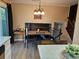 Dining area featuring a wooden table and chairs next to the staircase at 2034 S Truckee St, Aurora, CO 80013