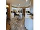 Open kitchen featuring a center island, stainless steel appliances, and lots of cabinet space at 2034 S Truckee St, Aurora, CO 80013