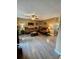Cozy living room featuring wood-look floors and comfortable seating at 2034 S Truckee St, Aurora, CO 80013