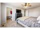 Spacious main bedroom with ceiling fan, and large closet at 16277 E Arkansas Dr, Aurora, CO 80017