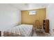 Bedroom with window offers natural light and a cozy space at 1536 S Field Ct, Lakewood, CO 80232
