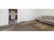 Living room adjacent to kitchen awaiting personalization at 1536 S Field Ct, Lakewood, CO 80232