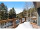 Enjoy breathtaking mountain scenery from this cozy balcony with sturdy wood railings and a peaceful atmosphere at 112 Illinois Gulch Rd # 6, Breckenridge, CO 80424