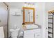 This bathroom features a stylish vanity, framed mirror, and a glass-enclosed shower at 112 Illinois Gulch Rd # 6, Breckenridge, CO 80424