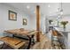 Dining area adjacent to the modern kitchen, featuring an adjacent patio at 112 Illinois Gulch Rd # 6, Breckenridge, CO 80424
