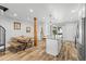 Kitchen and dining area with island seating at 112 Illinois Gulch Rd # 6, Breckenridge, CO 80424
