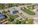 Aerial view showcasing the home's backyard with a deck, lawn, gazebo, and fenced perimeter at 25106 E 1St Ave, Aurora, CO 80018