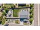 Aerial view of the property showcasing a landscaped backyard, gazebo, and well-maintained lawn at 25106 E 1St Ave, Aurora, CO 80018