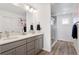 Elegant bathroom features double vanity, sleek countertops, and a glass-enclosed shower at 25106 E 1St Ave, Aurora, CO 80018