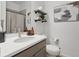 Modern bathroom featuring a sleek vanity, stylish mirror, and contemporary decor, provides a clean and inviting space at 25106 E 1St Ave, Aurora, CO 80018
