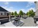 Spacious outdoor deck featuring dining and lounge areas with scenic views at 25106 E 1St Ave, Aurora, CO 80018