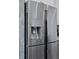 Close-up of the stainless steel, four-door refrigerator with water and ice dispenser at 25106 E 1St Ave, Aurora, CO 80018