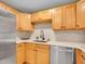 Modern kitchen features stainless steel appliances and light wood cabinetry at 1050 N Lafayette St # 408, Denver, CO 80218