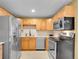 Updated kitchen featuring stainless steel appliances and ample counter space at 1050 N Lafayette St # 408, Denver, CO 80218