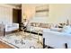 Inviting living room boasts stylish decor, a patterned rug, and modern furniture at 1050 N Lafayette St # 408, Denver, CO 80218