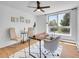 Bright office space with hardwood floors, large window, ceiling fan, and contemporary decor at 1050 N Lafayette St # 408, Denver, CO 80218