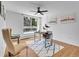 Bright office space with hardwood floors, large window, ceiling fan, and contemporary decor at 1050 N Lafayette St # 408, Denver, CO 80218